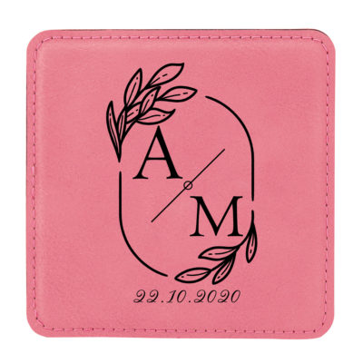 light blue leatherette coaster set on top of blue table next to cinnamon roll and cup of coffee